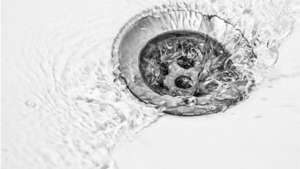 water flowing down a drain